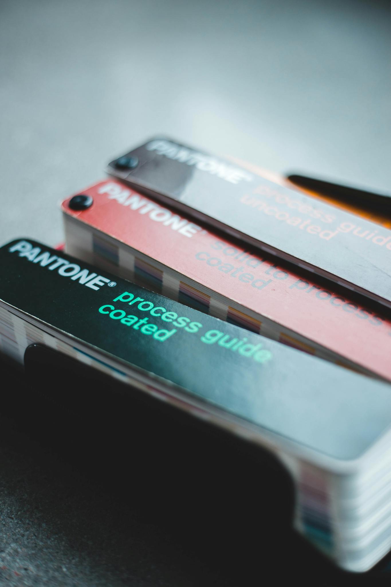 Close-up of Pantone color swatches with focus on design and color selection.